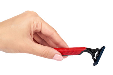 Obraz premium Red disposable shaving razor with hand isolated on white background.