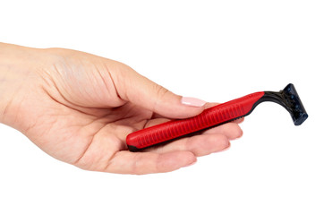 Red disposable shaving razor with hand isolated on white background.