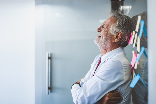 Old Senior Business Man Work Hard And Feel Tired And Exhausted At Office