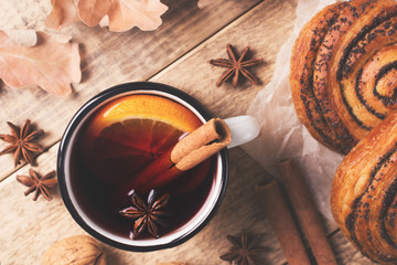 Traditional mulled wine in mug with pastry