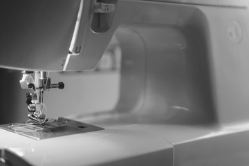 sewing machine black and white photo