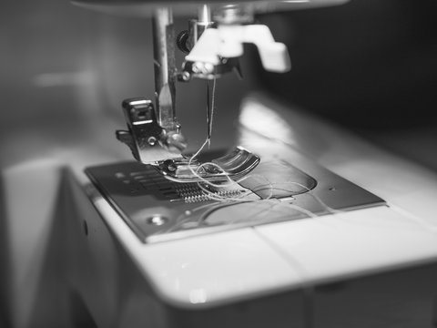 sewing machine black and white photo