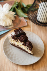 Cream cheese cake with chocolate cookies and brownies