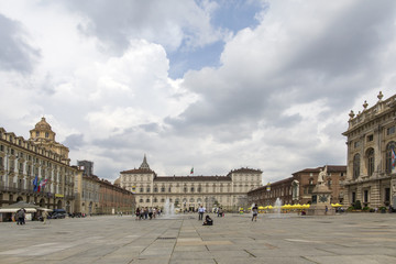 Fototapeta premium Turin, Italy- June 12, 2018: Piazza Castello, central baroque square in Turin, Italy. Tourists visiting Piazza Castello, the central baroque square