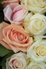 Pastel roses in a wedding arrangement