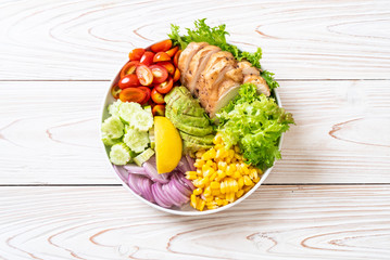 Healthy salad bowl with chicken breast