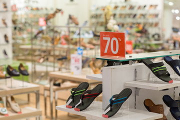 Obraz premium Shoe Sale concept. Shoes discount special price- Shopping, seasonal sale in shops, store