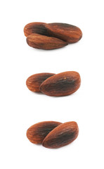 Pile of fried almond nuts isolated