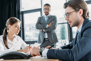 confident business people working together at conference hall at modern office