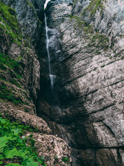 almost dried out waterfall in the swiss mountain alps