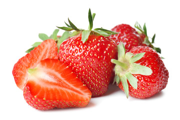 Ripe red strawberries on white background
