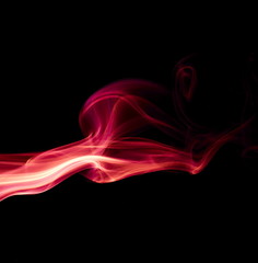 Red smoke on black background