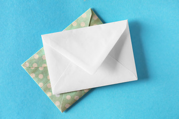 Mail envelopes on color background