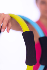 Woman doing pilates ring workout