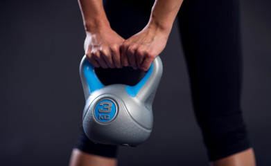 Woman kettlebell closeup