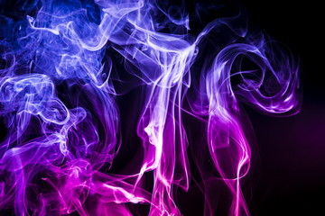 Colored smoke on black background