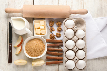Ingredients for preparing bakery on wooden table