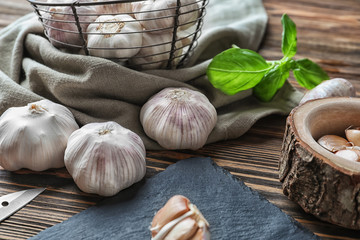 Fresh garlic on wooden background