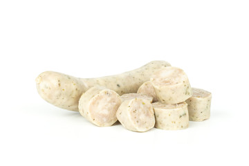 One whole lot of slices of bavarian white sausage isolated on white