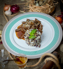 Meat piquant in sauce with rice