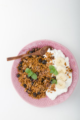 Granola baked in oven with nuts