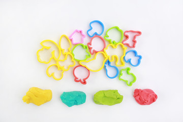 Colorful dough and mold on white background for kid play to develop EQ and IQ.