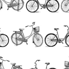 Fototapeta na wymiar Seamless background of bicycles sketches