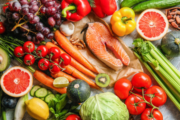 Various healthy products on wooden background