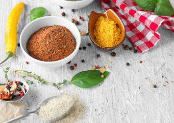 Various spices on wooden background