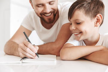 Portrait of a smiling young father and his son