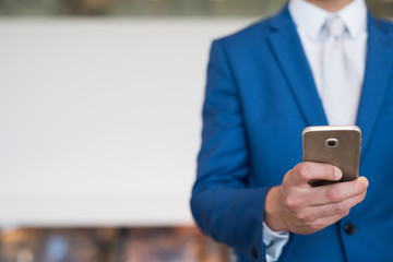 Businessman using cellphone