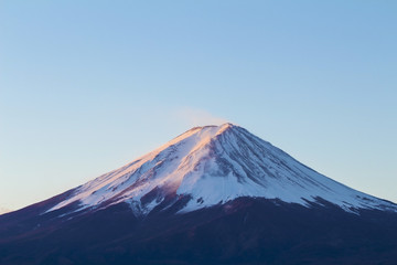 Closeup Fuji mountain (Fujisan) beautiful snowcapped volcano and famous natural landmark of Japan view from Kawaguchiko lake in Yamanashi Prefecture Japan