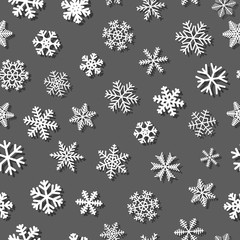 Christmas seamless pattern of snowflakes with shadows, white on gray background