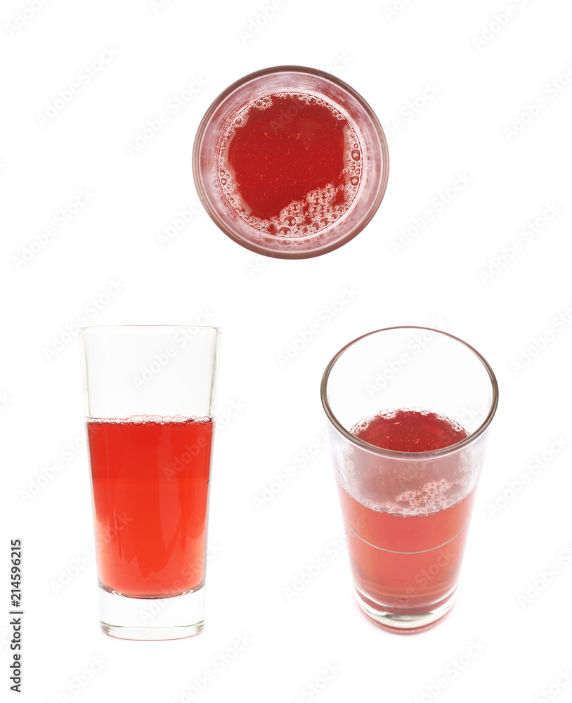 Wall mural Tall glass of juice isolated