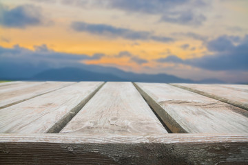 Empty wood table top on blur abstract background