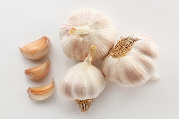 Fresh garlic on white background