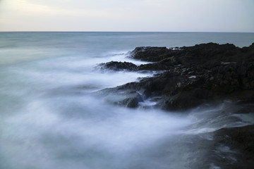 Long exposured rocks at the seacoast