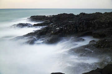 Long exposured rocks at the seacoast