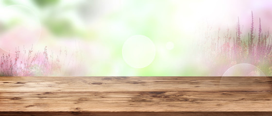 Tender floral background with wooden table