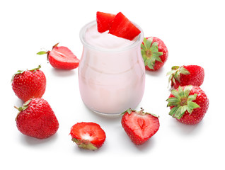 Glass jar with tasty yogurt and strawberries on white background