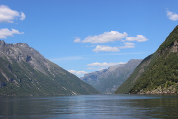 Obraz premium Beautiful view of Geirangerfjord surrounded by mountains. Near Geiranger, Norway.