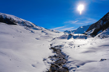 Fototapeta na wymiar Cerler snow stream in Pyrenees of Huesca Spain