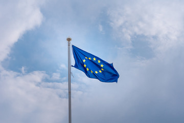 European Union flag on blue sky background