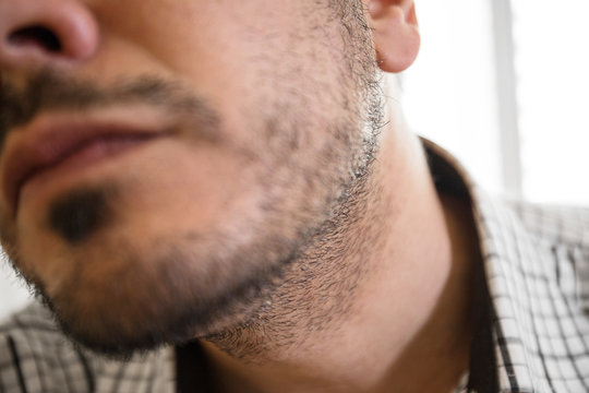Detail of man with short beard
