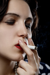 Obraz premium woman smoking joint