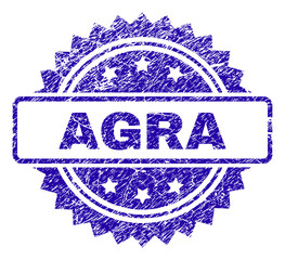AGRA stamp watermark with dirty style. Blue vector rubber seal print of AGRA text with dirty texture.