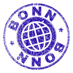 BONN stamp imprint with grunge texture. Blue vector rubber seal imprint of BONN caption with unclean texture. Seal has words arranged by circle and planet symbol.