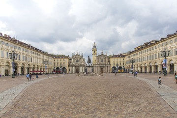 Obraz premium Turin, Italy -June 12, 2018 :Piazza San Carlo square and twin churches of Santa Cristina and San Carlo Borromeo in the Old Town center of Turin, Italy. Turin, San Carlo square, Italy