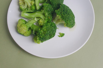 Broccoli on a plate. View from above. Candid.
