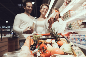 Close up Family in Supermarket in Dairy Department